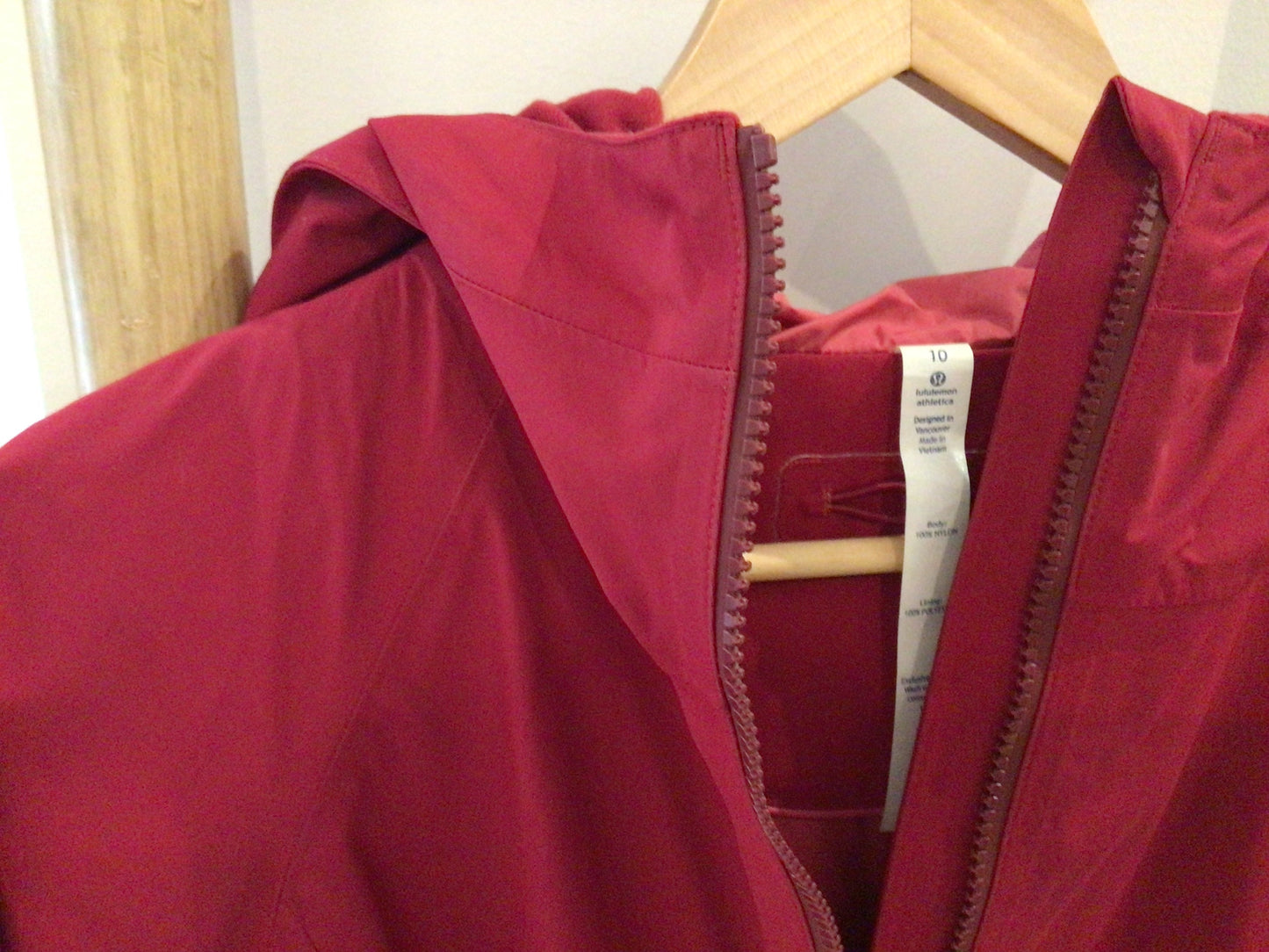 Consignment - 4399-05 Lululemon. Red rain coat. Sz. 10
