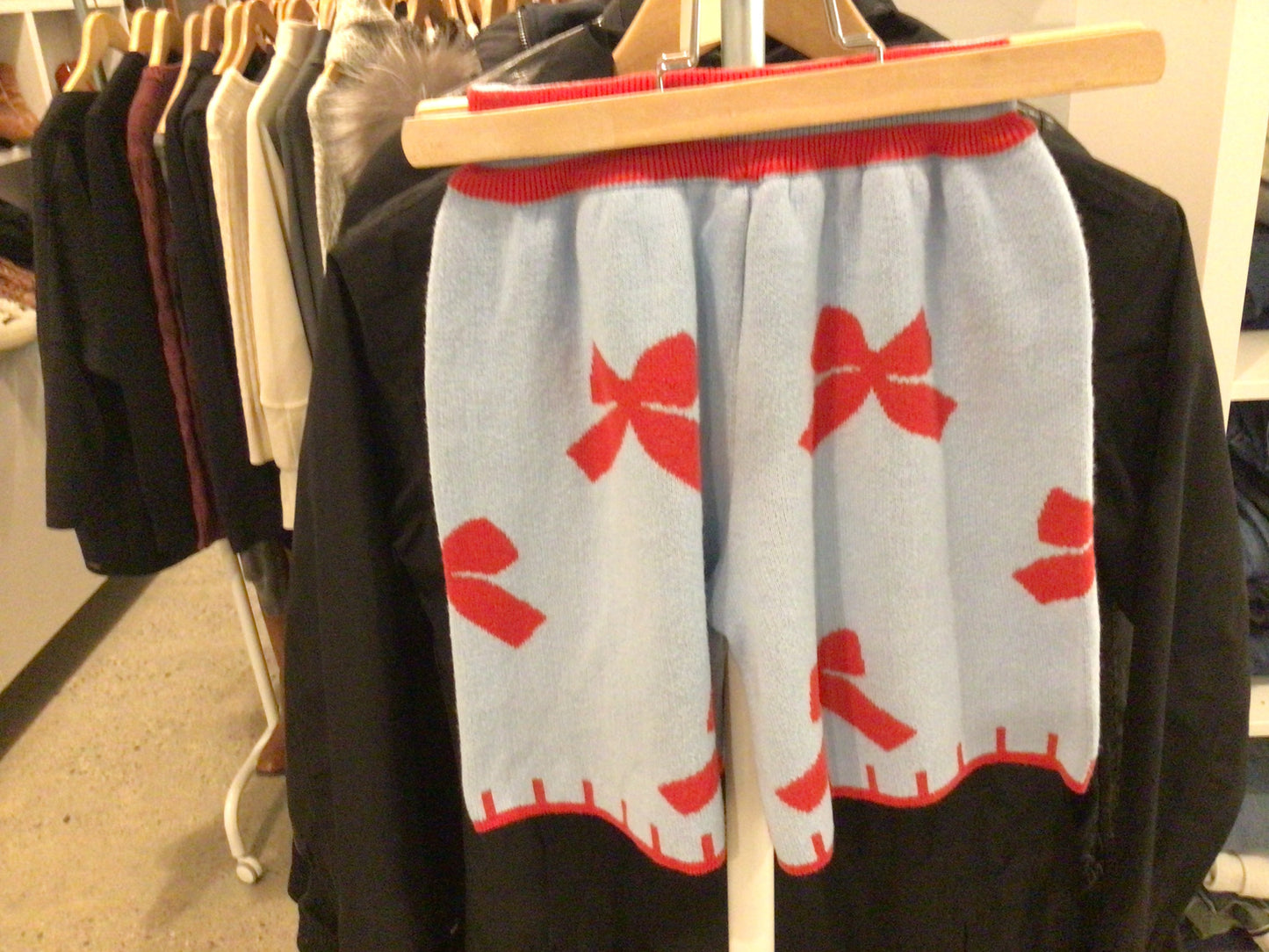 Consignment 3834-09 Two piece children’s Bebebebe Vous Aime culottes/sweater (blue with red bows). Toddler med.