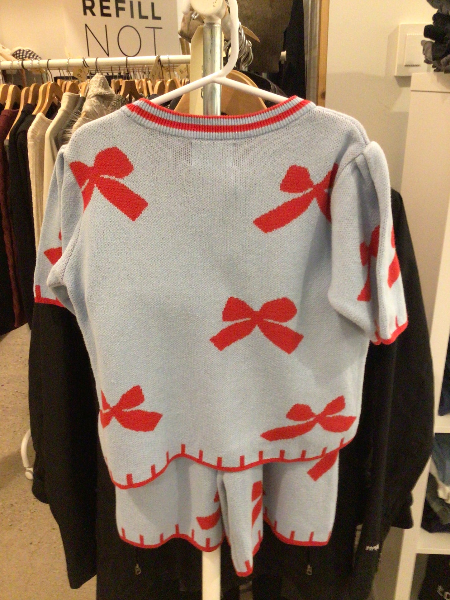 Consignment 3834-09 Two piece children’s Bebebebe Vous Aime culottes/sweater (blue with red bows). Toddler med.