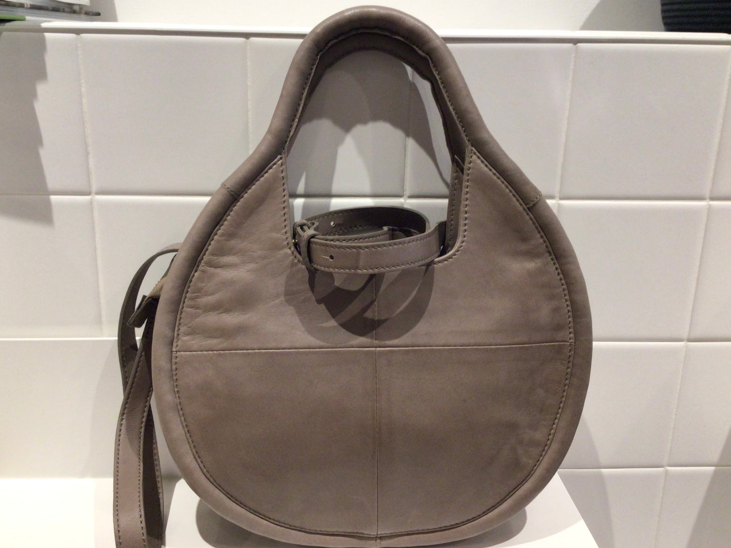 Consignment 5117-07 Anthropologie round brown leather bag.