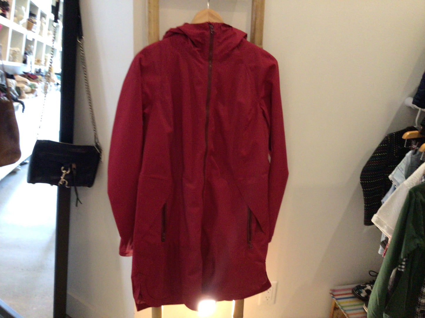 Consignment - 4399-05	Lululemon. Red rain coat. Sz. 10