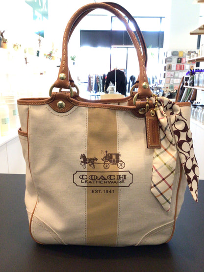 Consignment 0089-01 Coach Leatherware tote. Cream and tan canvas.