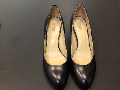 Consignment 8006-63	Michael Kors black leather pumps. Brand new. Size 7.5.